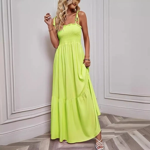 Neon green strapless summer maxi dress with tiered skirt and elastic bandeau detail