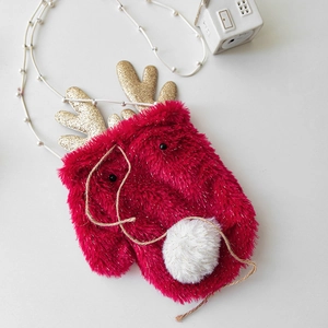 Red plush Christmas reindeer gift bag with gold sequined antlers and pearl strap