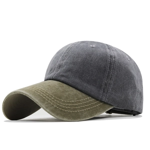 Detail of washed cotton baseball cap featuring two-tone grey crown and olive green brim