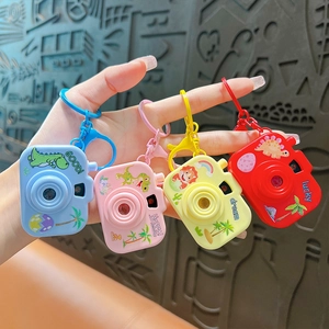 Colorful cartoon dinosaur projection camera keychains for backpack charms and kids gifts