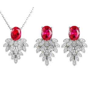 Elegant red oval gemstone jewelry set including silver-tone necklace and teardrop earrings