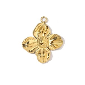 Detailed close-up of golden clover flower pendant with hollow spiral pattern and shiny finish