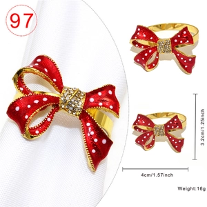 Red polka dot bow napkin ring with sparkling crystals and gold metal finish