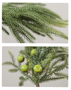 Macro detail of artificial pine needles and green berries for Christmas floral DIY decor