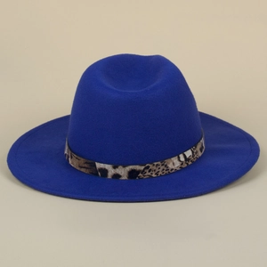 Close-up of royal blue fedora hat featuring a leopard print belt on wide flat brim
