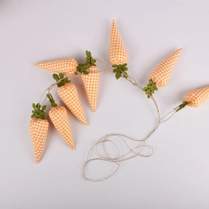 Easter carrot banner with seven orange checkered fabric carrots on twine for wall decor