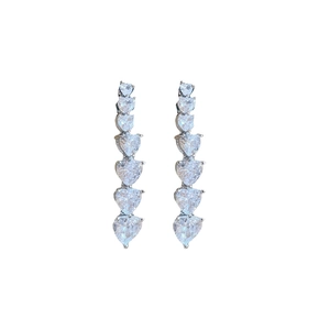 Elegant silver earrings with cascading heart crystals in a 18K gold plated drop design