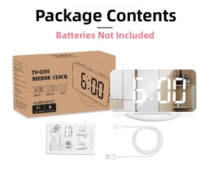 Detail view of the LED mirror clock package including USB cable and user manual