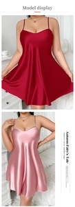Detailed view of red and pink satin chemise nightgowns with delicate spaghetti straps
