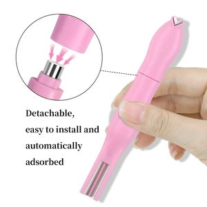 Pink magnetic nail cat eye tool with detachable head and heart-shaped metal detail