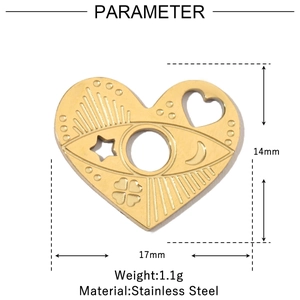 Detail view of heart-shaped stainless steel pendant with sun and moon celestial engraving
