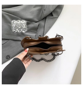 Top view of brown PU leather bag showing interior space and dark gunmetal chain strap