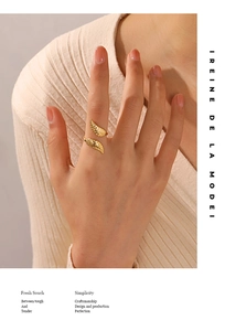 Detailed view of 18K gold plated leaf ring showing intricate vein textures and open design