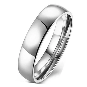 Macro shot of 6mm polished silver 316L titanium steel ring with smooth metallic luster