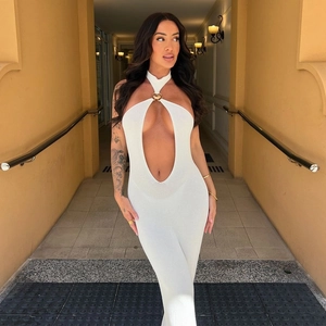 Detail of white knit halter maxi dress with cutout design and metal buckle accent