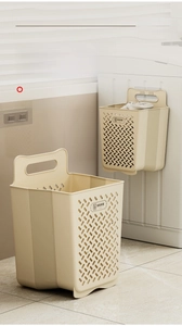 Beige foldable wall-mounted laundry basket with hollow mesh for ventilation