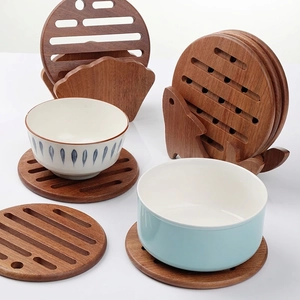 Round ebony wood heat insulation pads with decorative hollow design and storage base