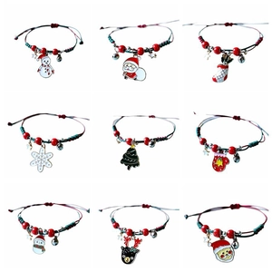Handmade woven Christmas bracelets set with Santa, snowman and reindeer charms