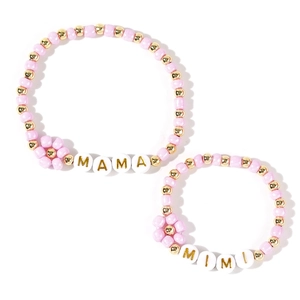 Pink beaded Mama and Mini bracelet set with golden flower charms and letter beads