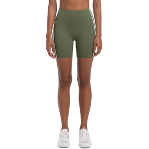 Close-up of olive green high-waist yoga shorts with side white stripes and elastic fabric