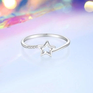Elegant S925 sterling silver hollow star ring with pavé zircon stones on gradient background