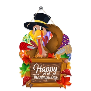 Detail of wooden Happy Thanksgiving door sign with turkey and maple leaf motifs