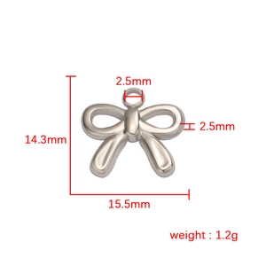 Technical drawing showing 14.3x15.5mm dimensions and 1.2g weight of silver bow pendant