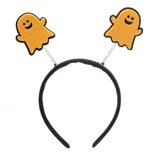 Detail of Halloween ghost headband with spring bobblers on a comfortable fabric wrap