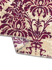 Detail showing the intricate damascus pattern fabric and high-quality edge stitching