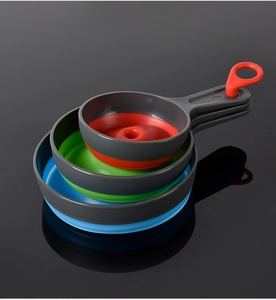 Three-piece set of foldable silicone kitchen funnels in red, green, and blue colors