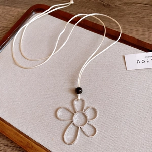 Bohemian wax cord necklace with silver hollow flower pendant and dark brown wood bead