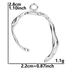 Detailed view of silver irregular oval charm with precise dimensions 2.8cm by 2.2cm