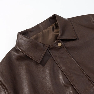 Deep brown faux leather jacket with lapel collar and antique bronze metal snap button