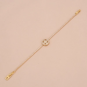 Close-up of 18K gold-plated clover bracelet with micro-paved sparkling zircon stones