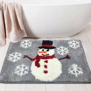 Detail of soft faux cashmere Christmas bathroom rug with festive snowman pattern and gray border