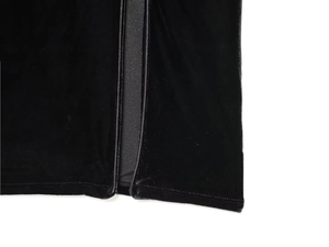 Close-up of side slit design and stitching on luxury black velvet qipao dress