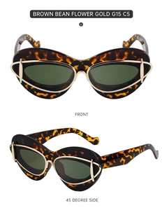 Close-up of cat-eye sunglasses with tortoise frame, gold metal trim and G15 green lenses