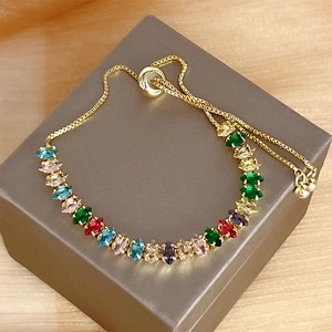 Gold-plated bracelet featuring colorful marquise-cut zircons and adjustable sliding clasp