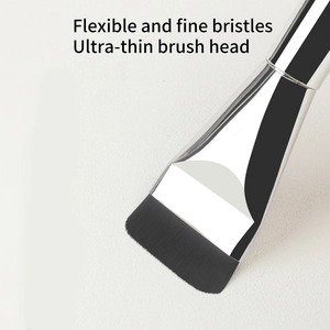 Macro shot of ultra-thin flat foundation brush head with flexible fine synthetic bristles