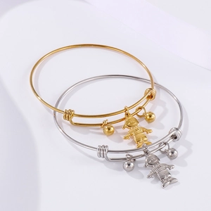 Retro titanium steel bracelets in gold and silver with cartoon character pendants