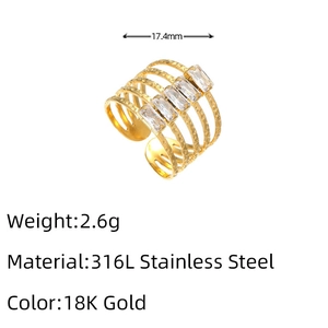 Macro detail of 18K gold plated stainless steel ring with four rectangular zircons