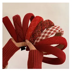 Elegant red sponge headbands in various textures like tweed and knit for festive Christmas style