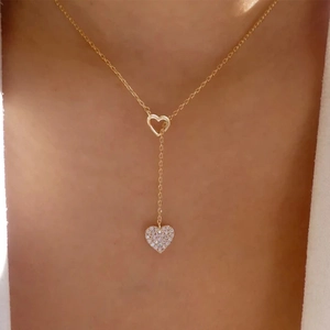 Close-up of double heart Y-shaped necklace with crystals on gold plated S925 silver chain