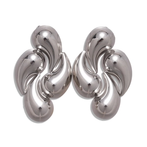 Polished silver irregular teardrop swirl earrings with a reflective metallic mirror finish