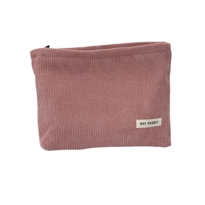 Pink corduroy makeup bag with large capacity, zipper closure, and May Rabbit woven label