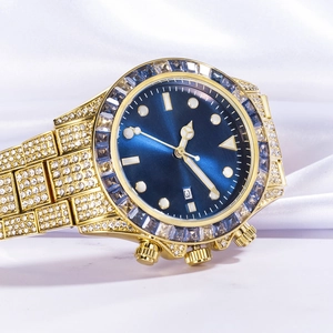 Macro shot of gold-plated diamond watch with blue sunray dial on luxury satin