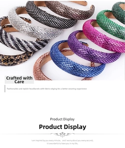 Close-up of stacked thick sponge headbands with glittering rhinestones in various colors