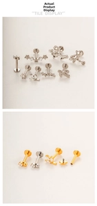 Macro shot of titanium labret studs featuring cactus, star and animal designs with zircons