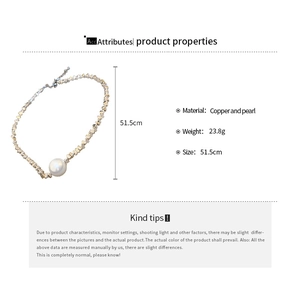 Detail view of pearl choker necklace with copper geometric chain and lobster clasp