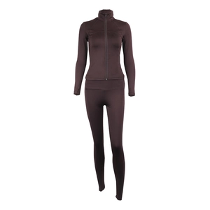 Close-up of brown zipper stand collar sports jacket and high waist yoga leggings set